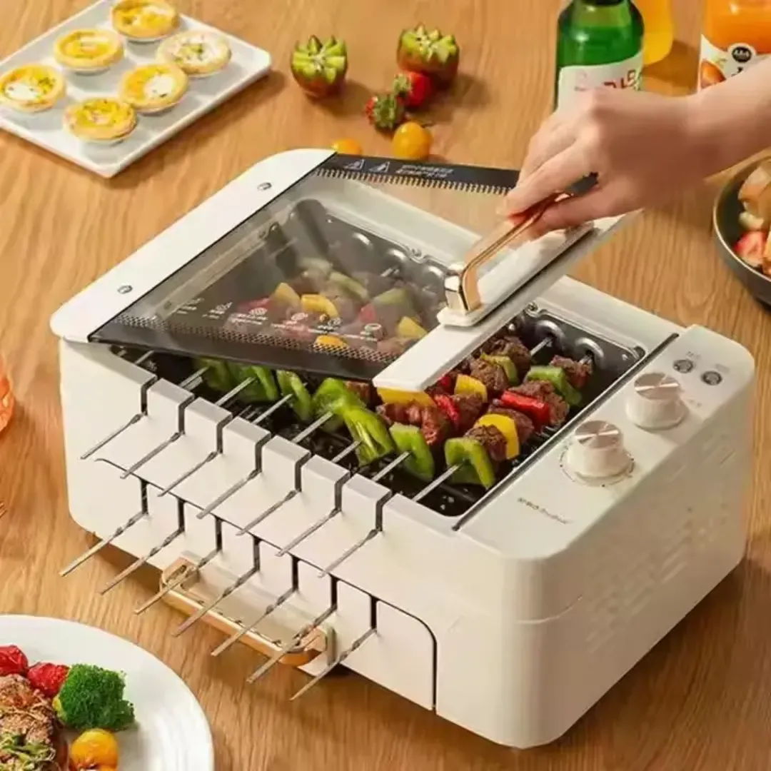Four à Barbecue Électrique Royalstar - Gril Sans Fumée Automatique pour Brochettes et Grillades en Intérieur